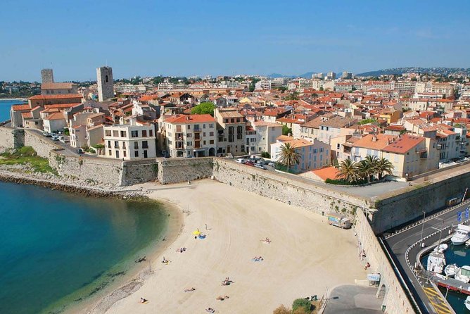 Best of the French Riviera with Cannes , Monaco & more Private guided Tour - Antibes Bay of Angels: marina views and a fortification wall moment
