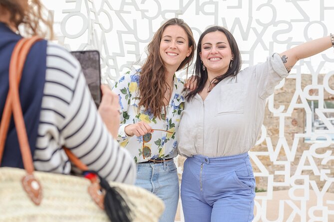 Cannes and Antibes Afternoon tour from Nice - La Croisette and Cannes hotels: palm trees, luxury storefronts, and an easy win