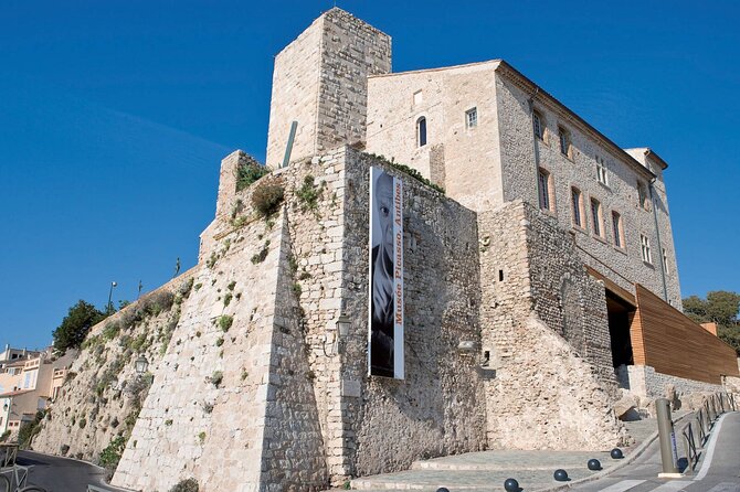 Full day Guided Tour: Cannes, Antibes, St Paul de Vence from Nice - Le Suquet in Cannes: shaded Old Town streets and the church-view option