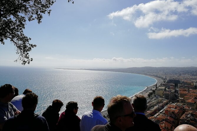 Nice Small-Group Old Town & Castle Hill Cultural Walking Tour with a Local Guide - Meeting by Castel Plage, then easing into the hill