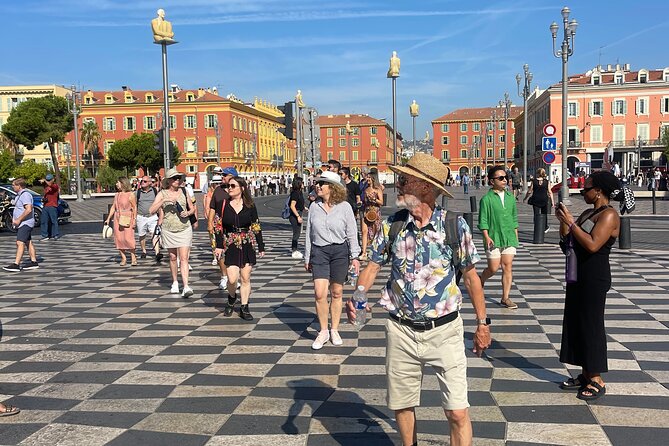 Walking tour of Nice, the old town & the Coline du Château - Stop 3: Cours Saleya Flower Market, color and scent with local rhythm